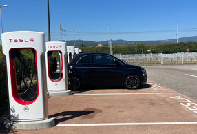   It took between 30 and 40 minutes to fully charge the Fiat 500 with a Tesla Supercharger ((Claudine and Alix))
