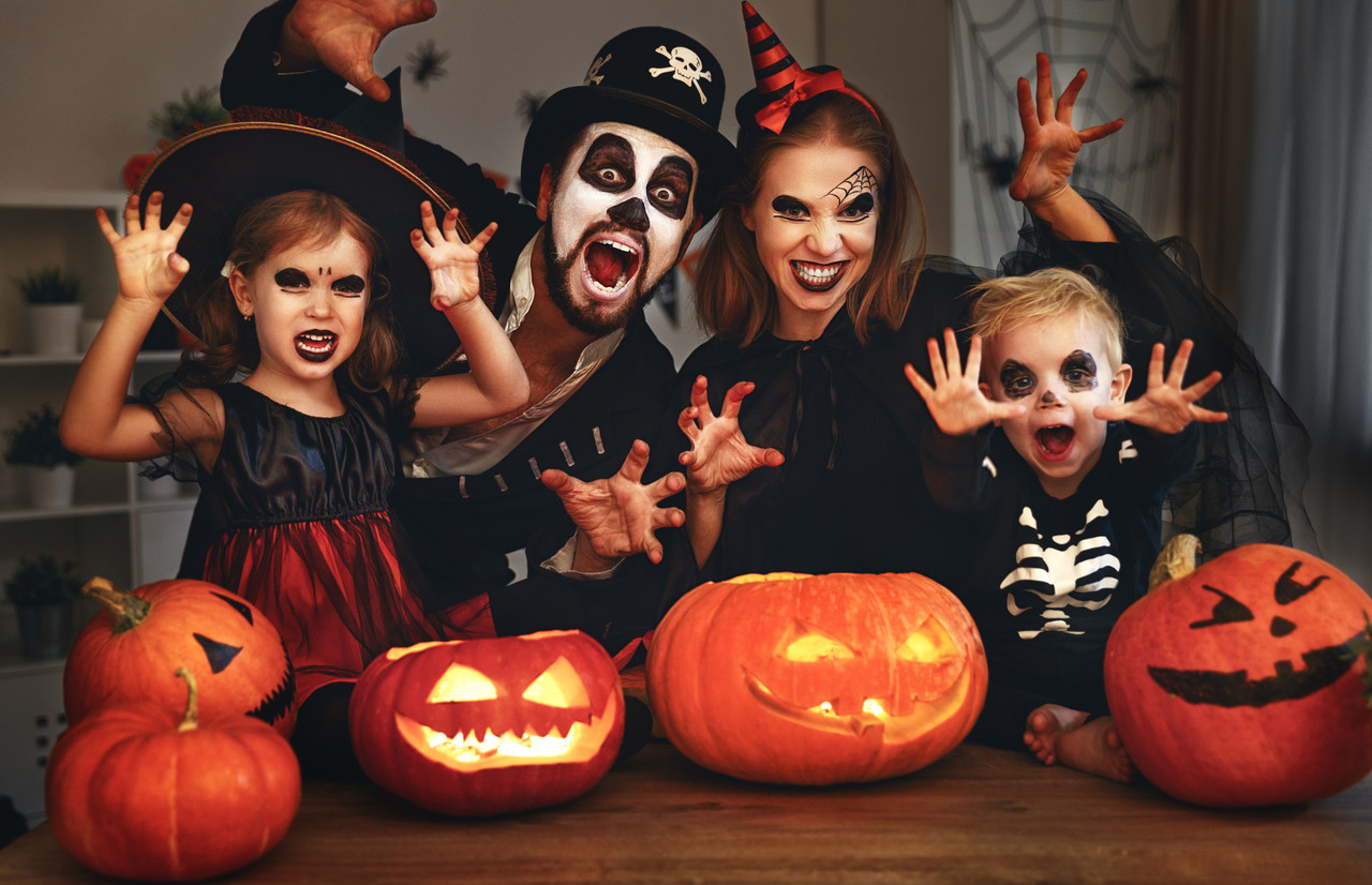 A Family in costumes and makeup on a celebration of Halloween Evgeny Atamanenko/Shutterstock