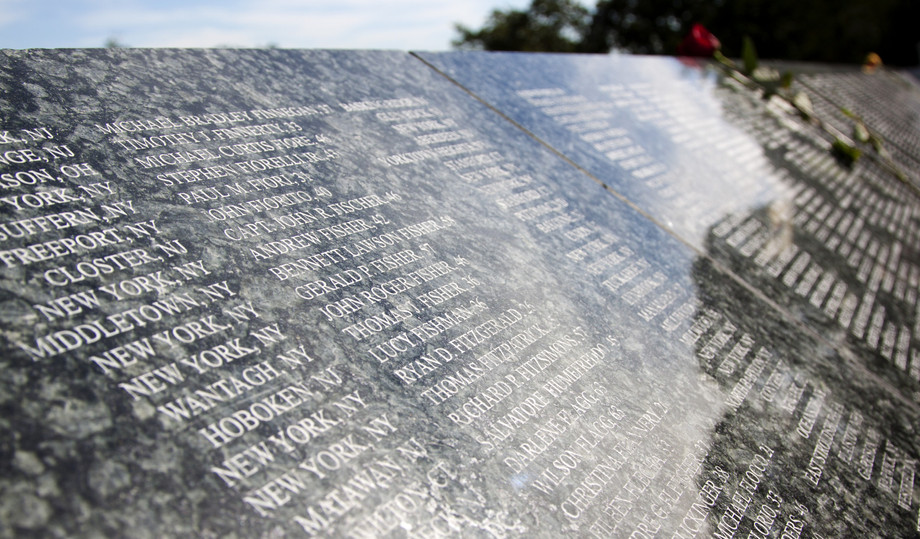 A 911 memorial granite wall with names etched on it inside Eagle Rock Reservation, in West Orange, NJ, honours victims of the 2001 terror attacks, seen in 2012. Photo: Glynnis Jones/Shutterstock.