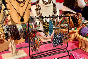 Intricately beaded earrings, delicate bracelets and other handcrafted goods such as belts, bags and hacky-sacks were for sale at the Guatemala stand. Photo: Lydia Linna/Maison Moderne