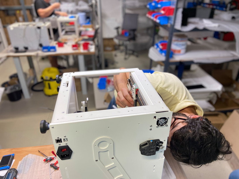 An employee pieces together a 3D printer at the Anisoprint manufacture facility in Luxembourg Anisoprint