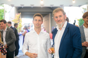 Attendees are seen during Lhoft’s 5th anniversary reception, 8 July 2022. Photo: Matic Zorman