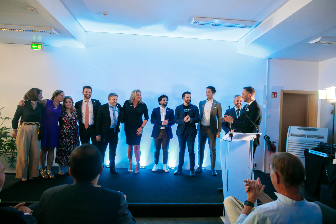  Lhoft employees are called on stage for a round of applause at the organisation’s 5th anniversary celebration, 8 July 2022. Photo: Matic Zorman