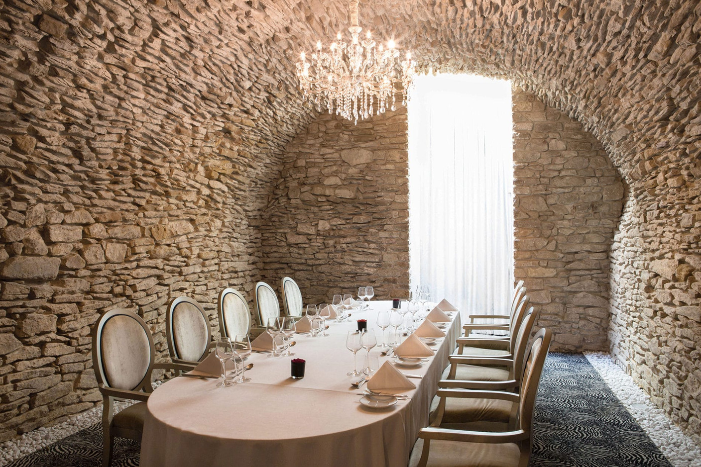 The Vauban lounge and its incredible stone walls. Photo: Le Place d'Armes
