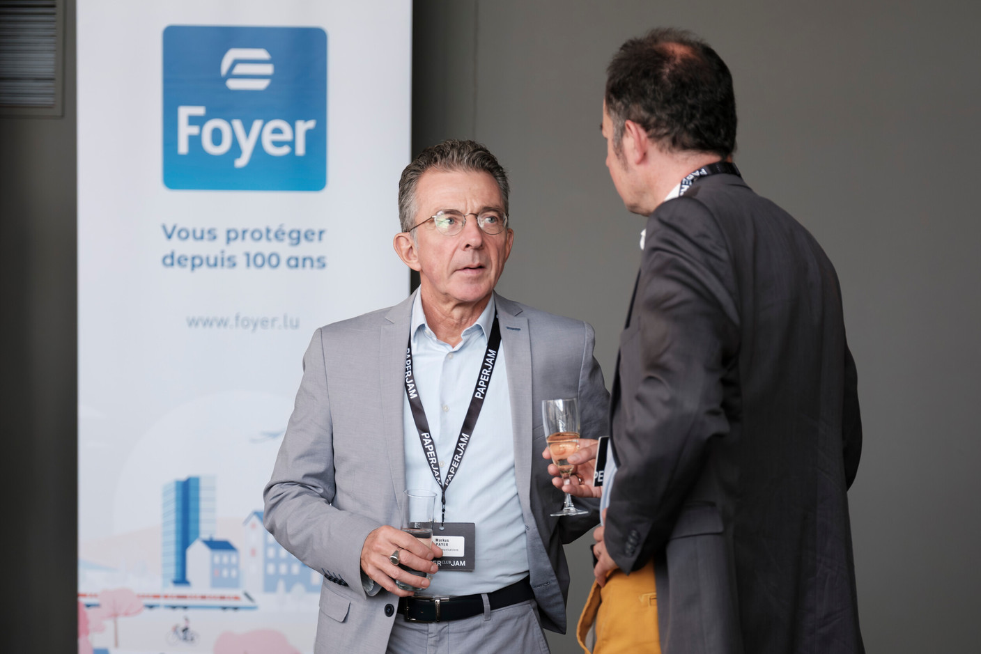 Markus Payer (WaveL Communications) on the left. (Photo: Jan Hanrion/Paperjam)