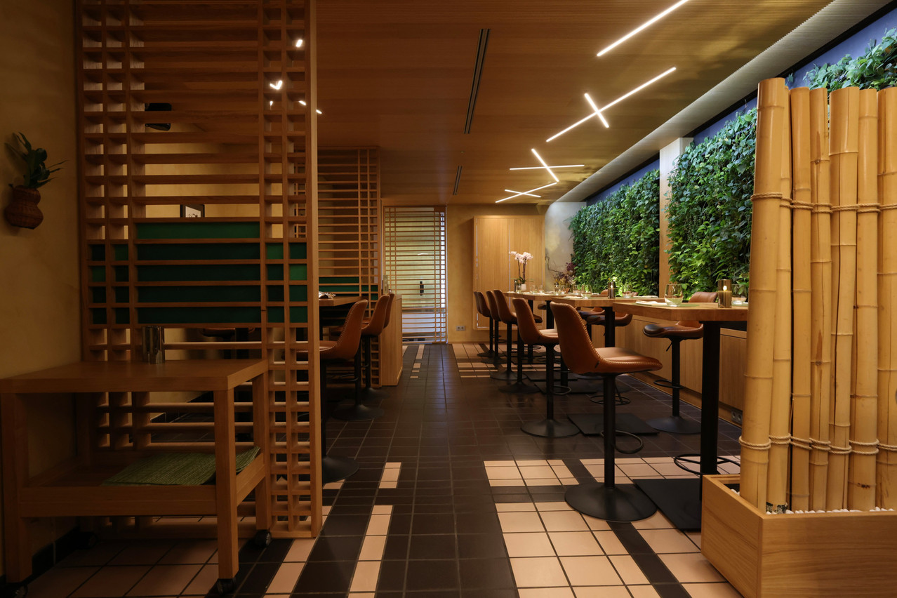 In the restaurant’s dining room, the traditional tables have been replaced by high ones, for less formal seating. Photo: Guy Wolff/Maison Moderne