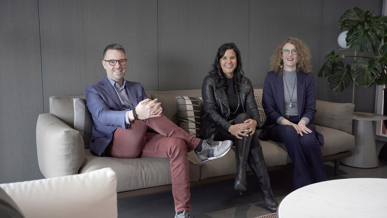 The law firm, represented here by Patrick Mischo, Magali Maillot and Claire Danda, has increased its parental leave income to encourage its employees, both men and women, to take it. (Photo: Allen & Overy)