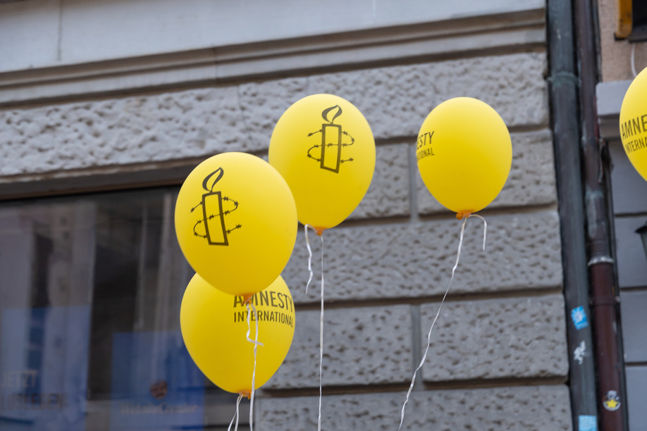 Amnesty International raises awareness on human rights’ breaches during worldwide campaigns.  Copyright (c) 2021 Robert Buchel/Shutterstock.  No use without permission.