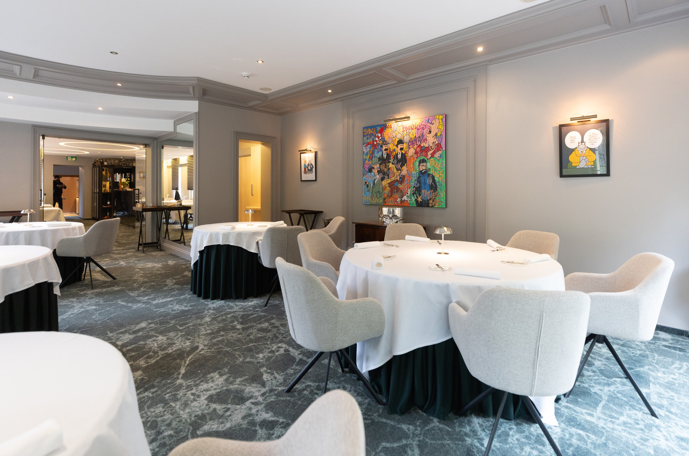 The main dining room has a sober, relaxed contemporary feel. Photo: Guy Wolff/Maison Moderne