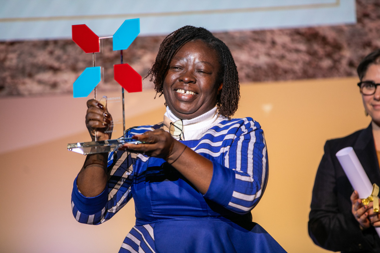 The European Microfinance Award ceremony was hosted at the European Investment Bank on 16 November 2023. The prestigious annual prize rewarded the recipient with €100,000 in front of around 350 participants. Pictured: the winner, Claire Lossiane, director of Yikri. Photo: Infine