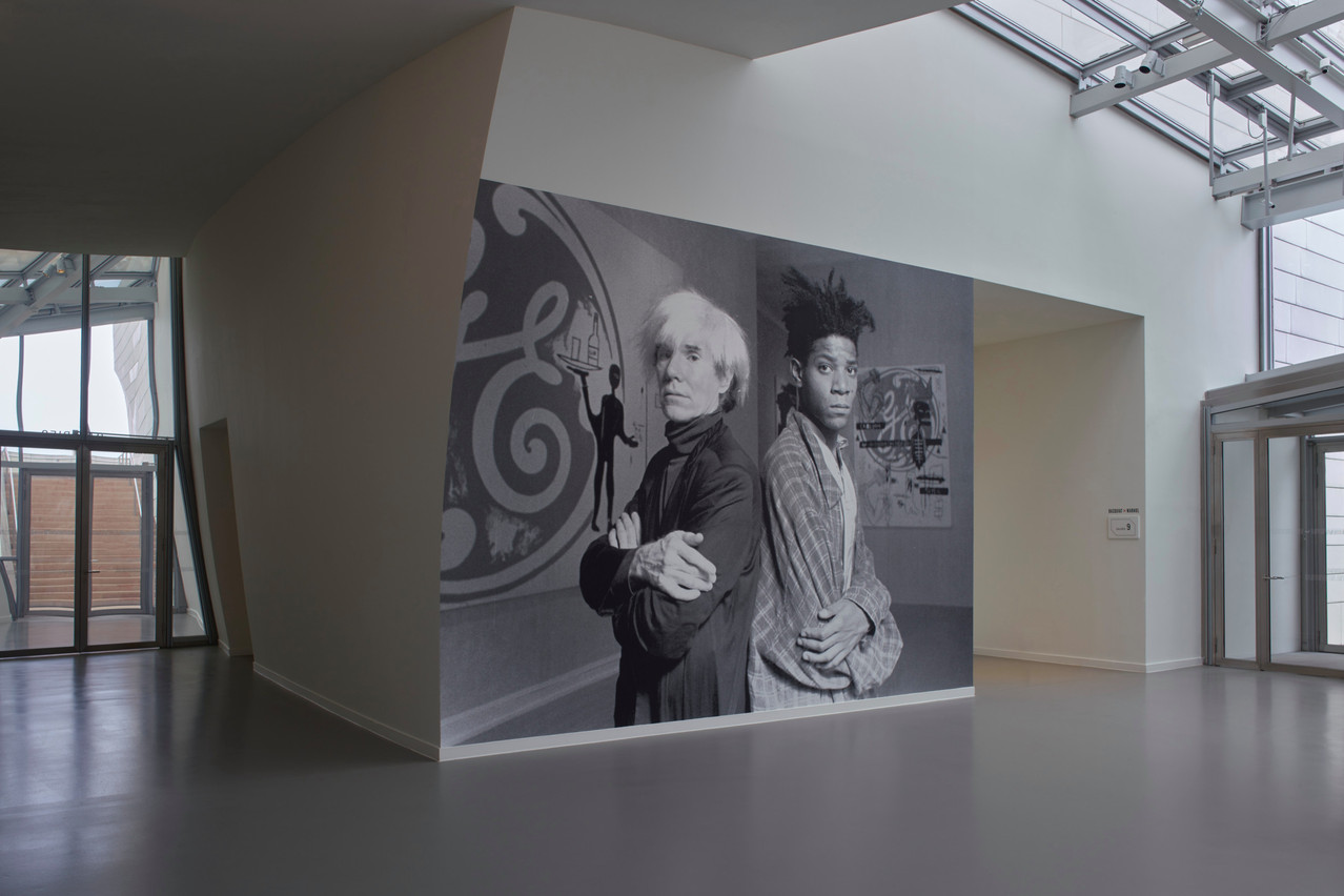  A view of the “Basquiat × Warhol. Painting four hands” at the Fondation Louis Vuitton in Paris, open until 28 August 2023. The painted mural features Andy Warhol and Jean-Michel Basquiat posing in front of General Electric with Waiter, at the Tony Shafrazi Gallery, New York, 24
September. © Estate of Jean-Michel Basquiat Licensed by Artestar, New York, 2023; © The Andy Warhol Foundation for the Visual Arts, Inc. / Licensed by ADAGP, Paris, 2023; © Fondation Louis Vuitton / Marc Domage. Mural painted by: © Richard Drew/AP/SIPA
