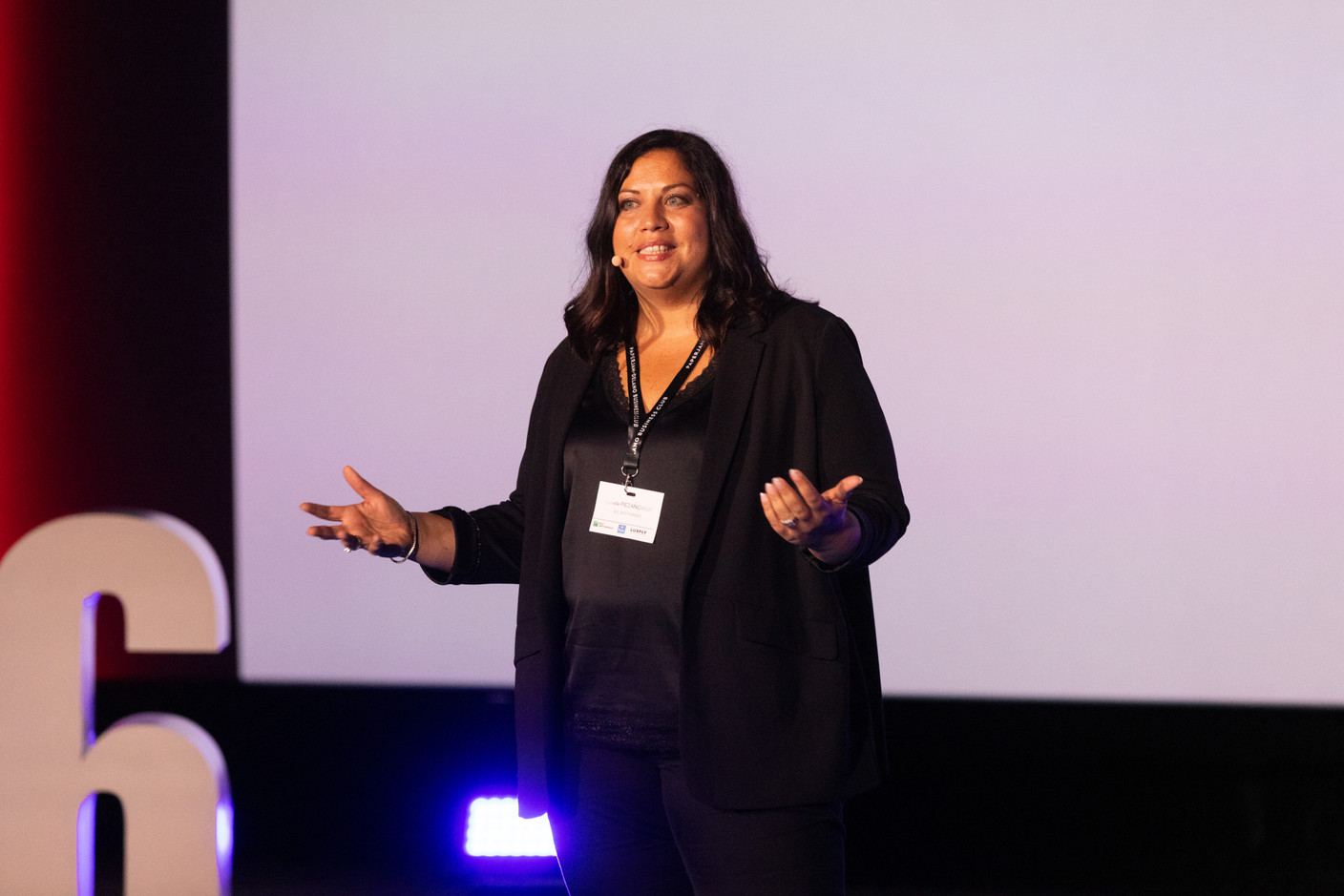 Cyrielle Piezanowski (BGL BNP Paribas), speaking at the 10x6 Expat Rockstars event organised by the Paperjam Club at Kinepolis Kirchberg, 19 September 2024. Photo: Eva Krins/Maison Moderne