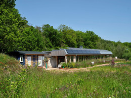 Inspired by the Earthship concept, the Äerdschëff in Redange-sur-Attert is a bioclimatic public building constructed using recycled and locally sourced materials. It is self-sufficient in water and energy and hosts activities to raise awareness of the ecological transition.  (Photo: Beng Architectes Associés)