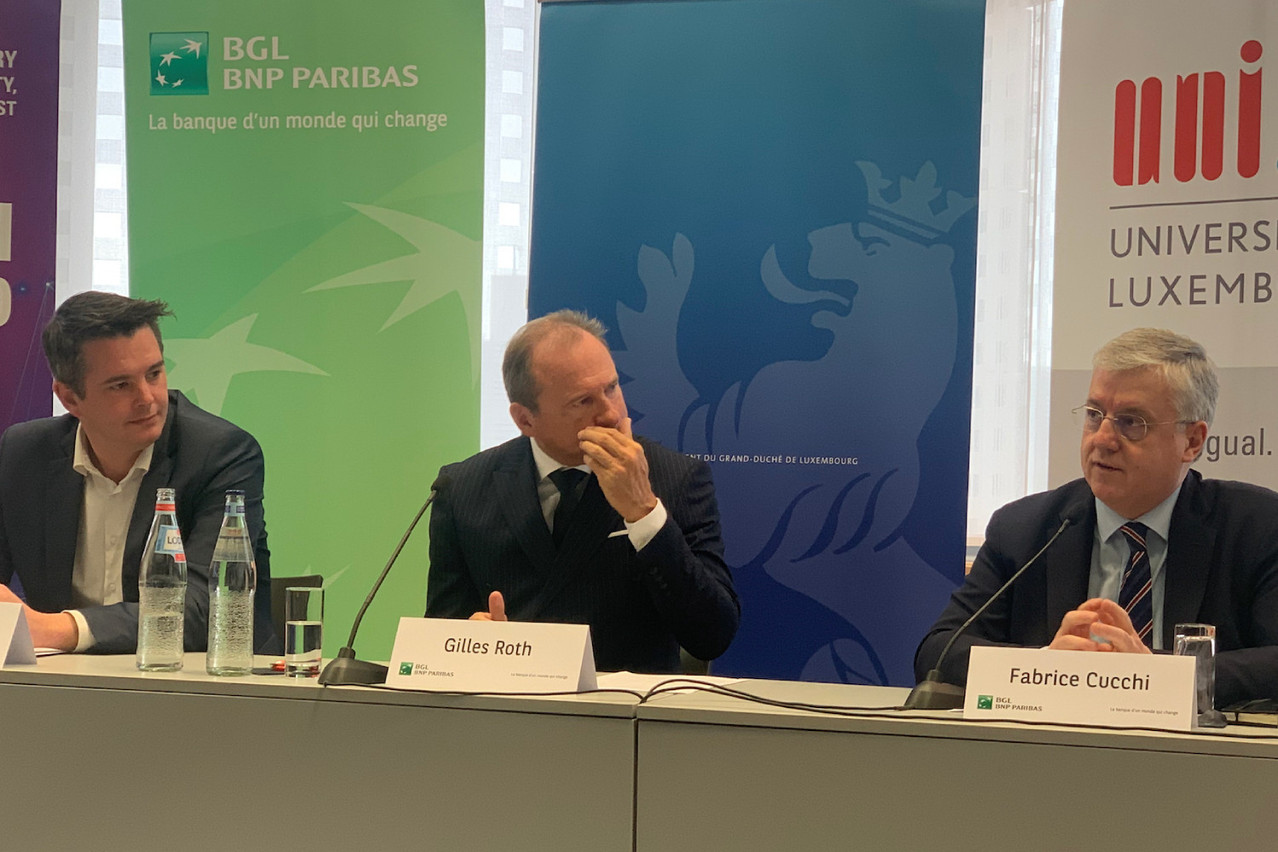Economy minister Lex Delles (DP) and finance minister Gilles Roth (CSV) pictured with Fabrice Cucchi, CTO of BGL BNP Paribas, during a press conference at the bank’s headquarters on 25 January 2024. Cucchi explained the dual benefits of the project co-financed for the bank and Luxembourg’s financial centre. Photo: Maison Moderne