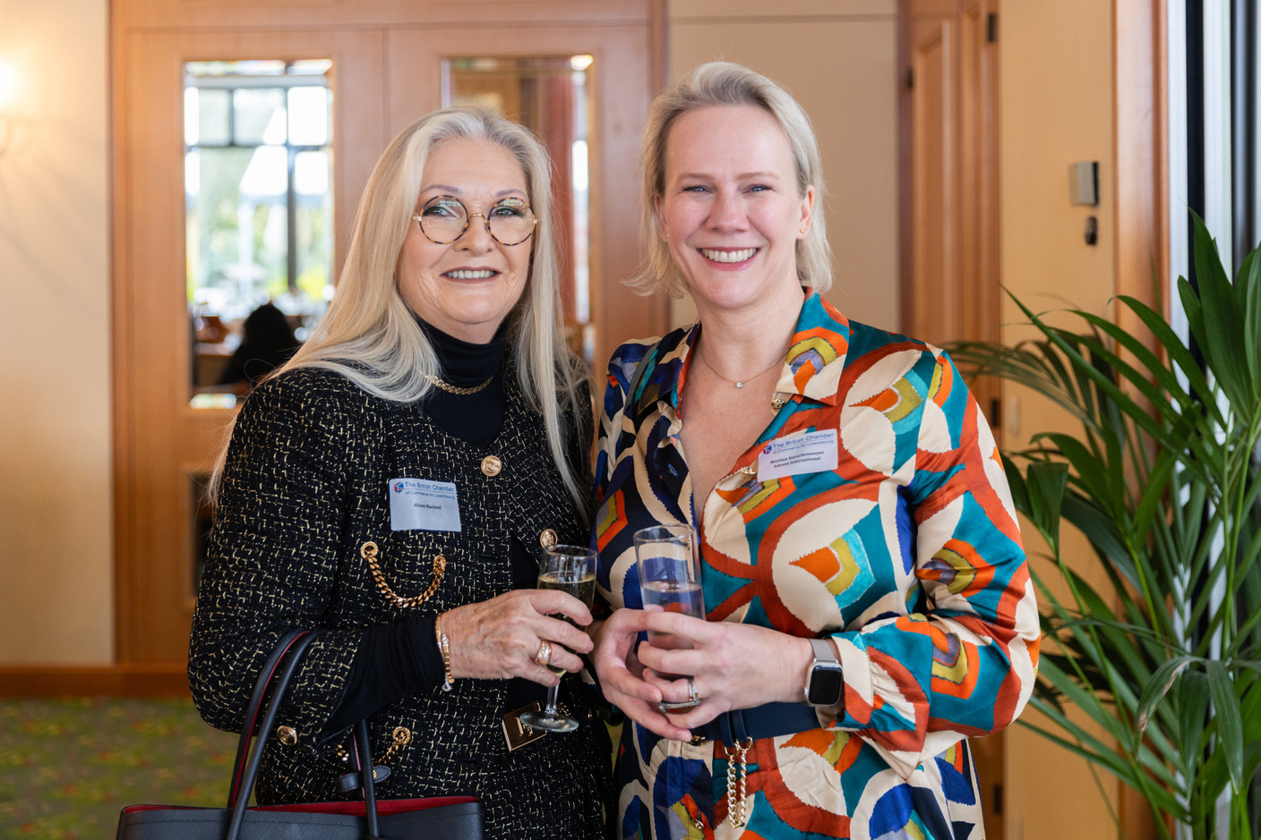 (l-r) Alison Macleod, head of real estate services at KPMG Luxembourg, with Martine Kerschenmeyer, director limited partner services at Advent International, at the BCC & Amcham Personal Tax Lunch on 21 November 2023. Photo: Romain Gamba / Maison Moderne