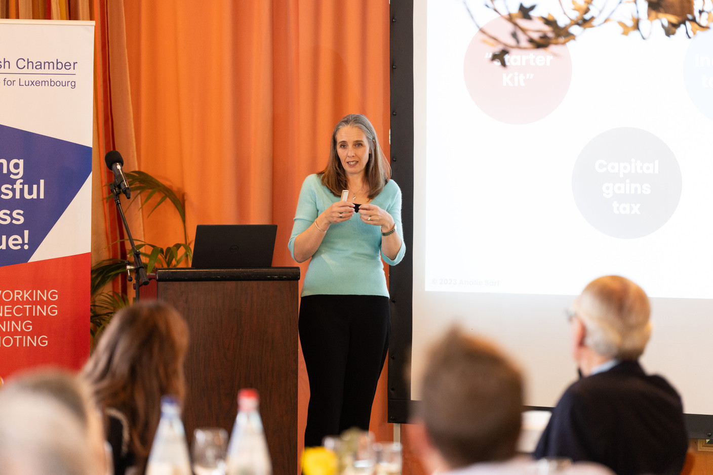 Laura Foulds, managing director at Analie Tax & Consulting, speaking at the BCC & Amcham Personal Tax Lunch on 21 November 2023, at Hotel Parc Belair. Photo: Romain Gamba/Maison Moderne