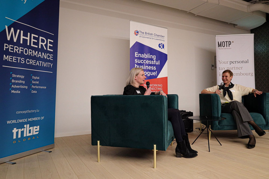 Paule Kremer, the only Luxembourg known to have swam the English Channel, speaks on stage with the British Chamber of Commerce for Luxembourg’s Claudia Neumeister during an International Women’s Day event, 8 March 2022. Photo credit: BCC/Ali Sahib