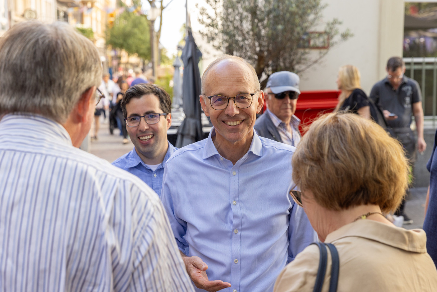 Luc Frieden, lead candidate for the CSV, seen smiling at the CSV stand in Luxembourg’s city centre, during the braderie (street market), 4 September 2023. Photo: Romain Gamba/Maison Moderne