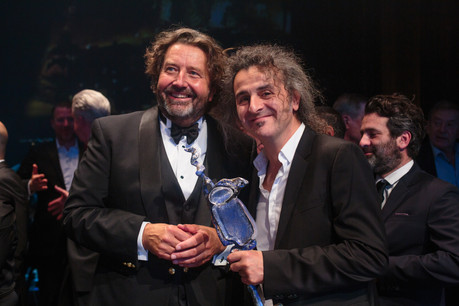 Guy Daleiden (Film Fund) et Donato Rotunno (Tarantula) lors du Filmpräis 2018. (Photo: Matic Zorman / Archives)