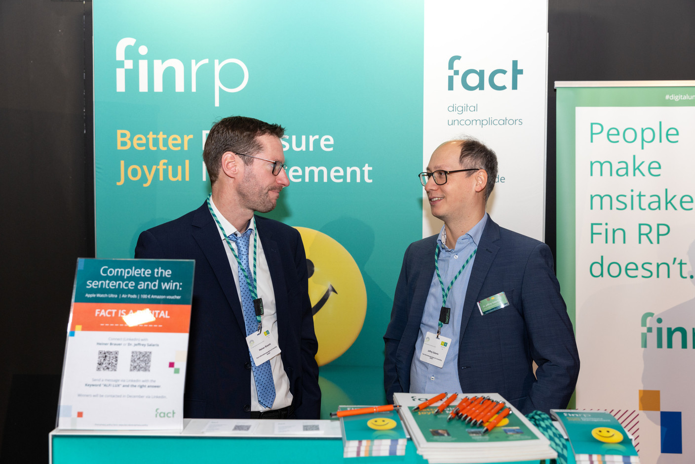 Heiner Brauers and Jeffrey Salaris, both at Fact Informationssysteme, seen in the company’s stand during Alfi’s Private Assets Conference, 28 November 2023. Photo: Romain Gamba/Maison Moderne