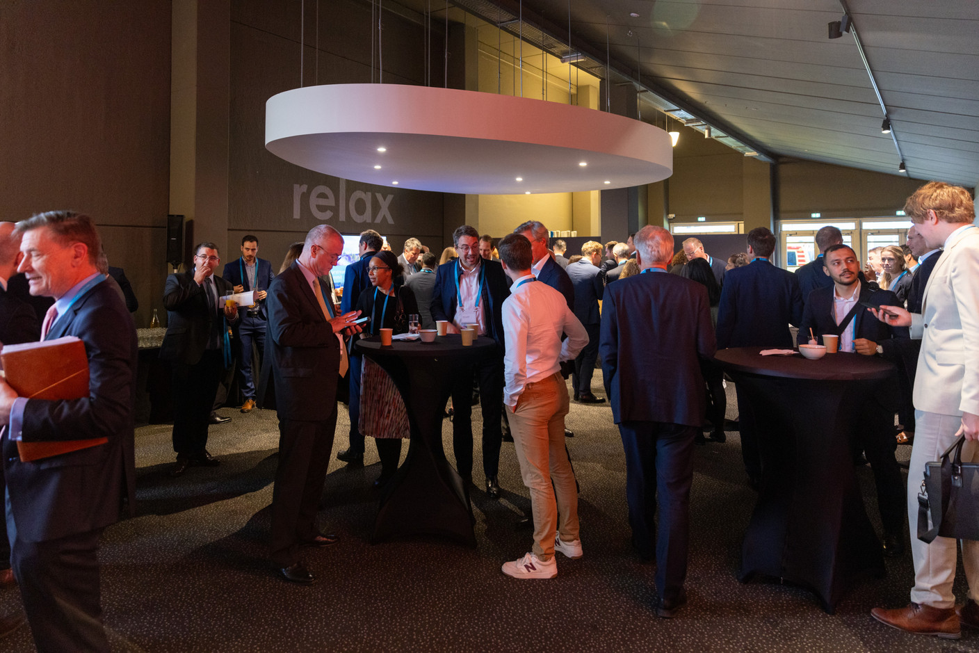 Attendees seen during the coffee break at the Clearstream Fund Summit on 12 October 2023 at the Kinepolis in Kirchberg. Photo: Romain Gamba/Maison Moderne