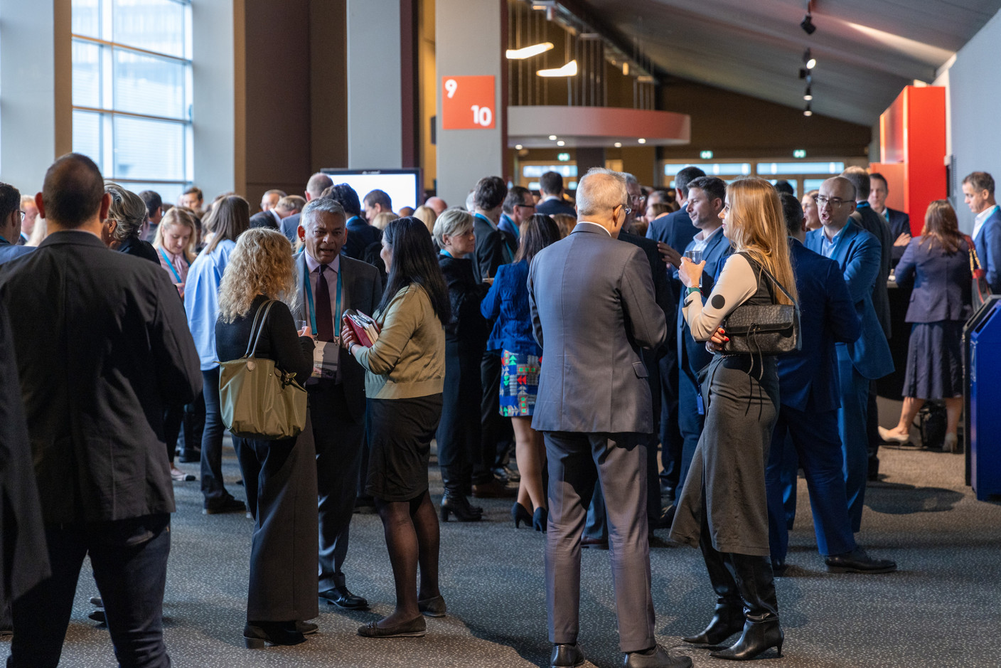 Attendees during the coffee break at the Clearstream Fund Summit on 12 October 2023 at the Kinepolis in Kirchberg. Photo: Romain Gamba/Maison Moderne