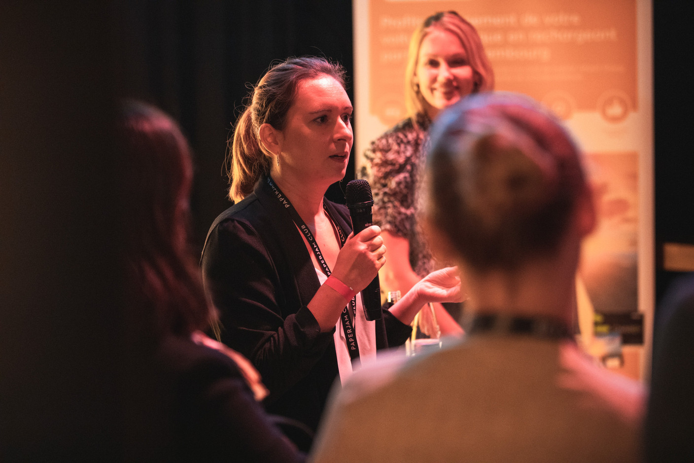 Nele Segers, HR business partner at IQ-EQ, is seen speaking on the “Delano Live: How to move up without burning out?” panel, 16 November 2021. Photo: Simon Verjus/Maison Moderne