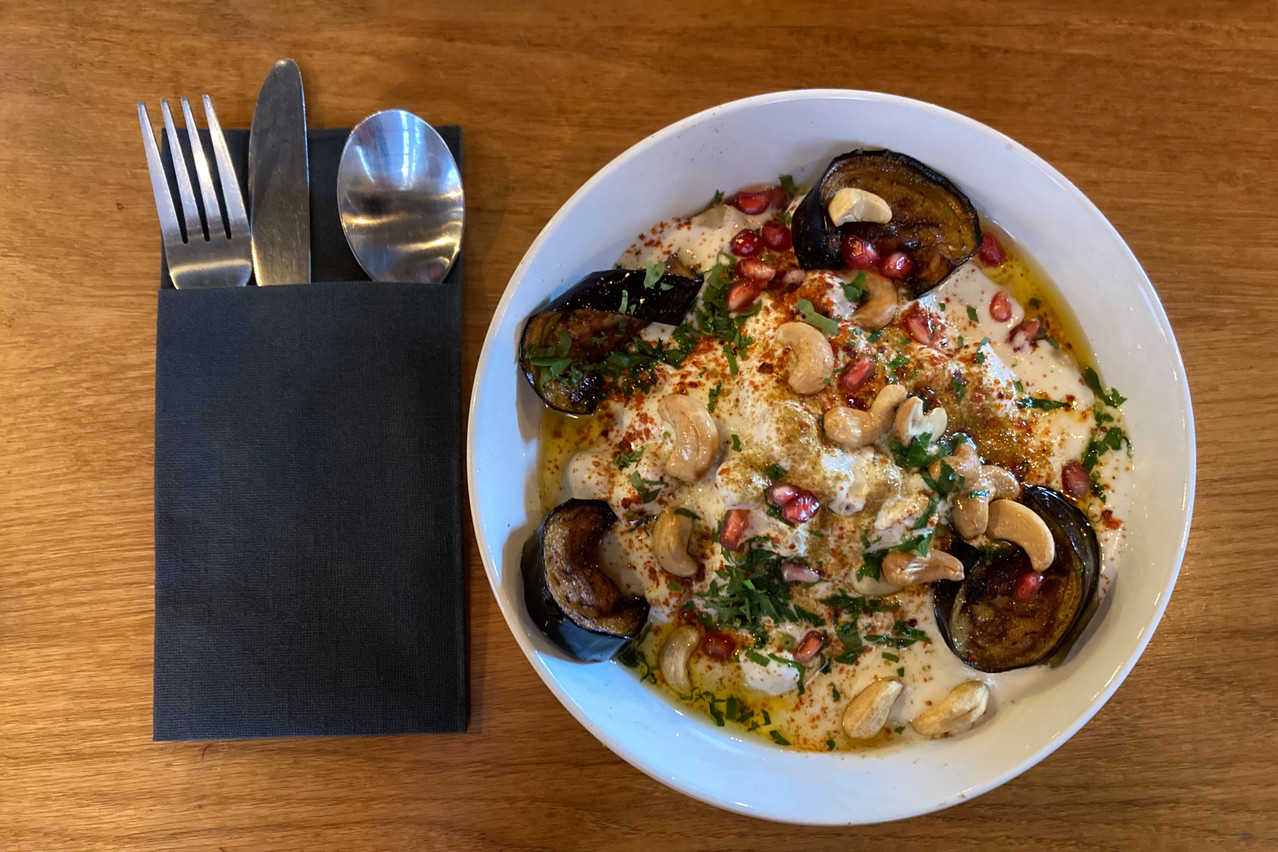 Pomegranate seeds add a delightful little “crunch” to the vegetarian fatteh at Chiche. Photo: Lydia Linna