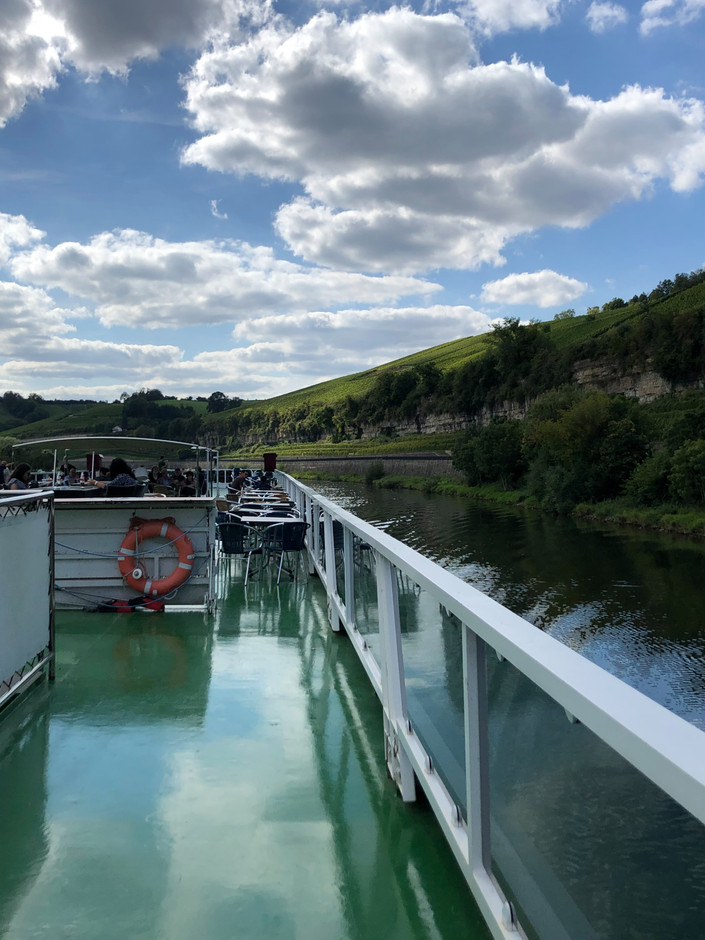 Enjoy a drink and the pleasant weather from the top deck of the boat. Photo: Lydia Linna