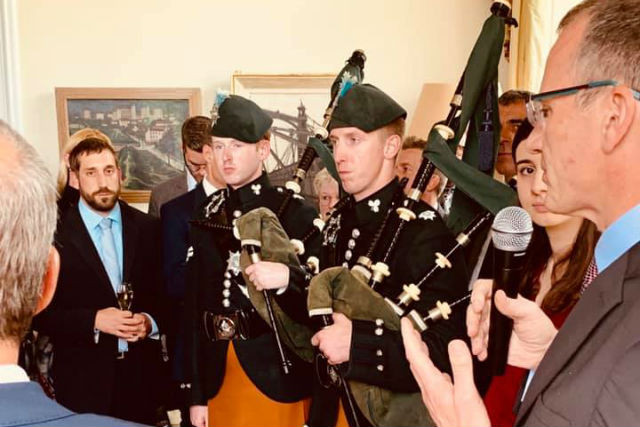 Two Irish Guards pipers stand next to British ambassador to Luxembourg John Marshall, 13 June 2019 British Embassy Luxembourg