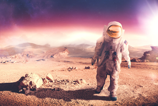 Artists' impression of an astronaut on an unexplored planet Shutterstock