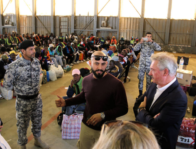 Luxembourg’s foreign minister, Jean Asselborn (front, right), visits an operation near Tripoli to return undocumented migrants from Libya, 5 February 2018 SIP