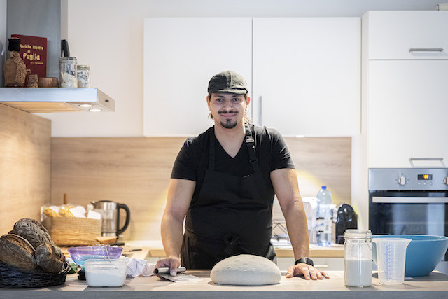Martino Martucci pictured here in his Luxembourg City kitchen with a freshly-shaped sourdough boule (Photo : Patricia Pitsch/Maison Moderne)