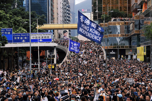 The Hong Kong anti-extradition bill protests are a series of ongoing demonstrations in Hong Kong. police fire teargas as thousands march in Yuen Long. Shutterstock