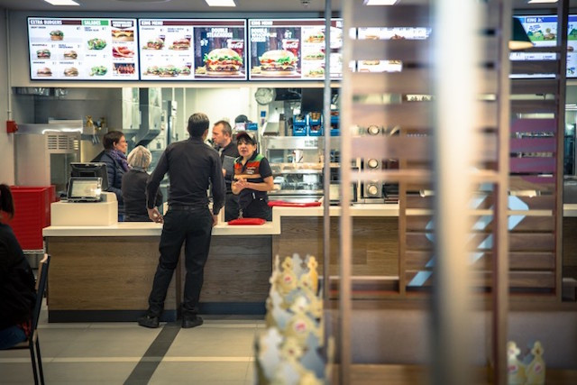 A customer places an order inside the new Burger King fast food restaurant on avenue de la Gare, in Luxembourg City, on 25 April 2017 Maison Moderne