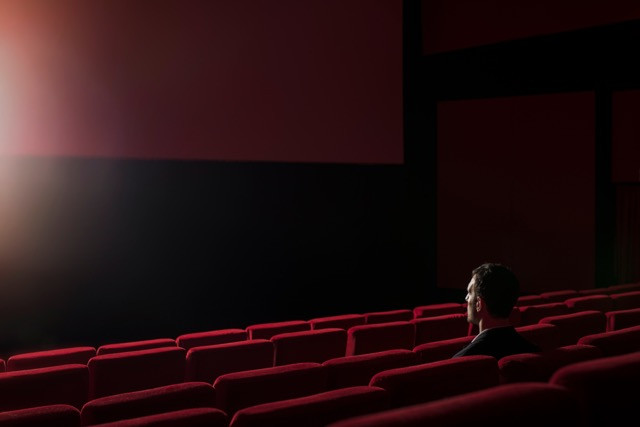 Cinemas will reopen under strict health and safety measures, including social distancing in screening rooms. Shutterstock