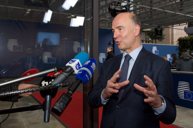 Pierre Moscovici, European tax commissioner, speaks with press prior to an EU finance ministers meeting in Brussels on 4 December 2017 European Council