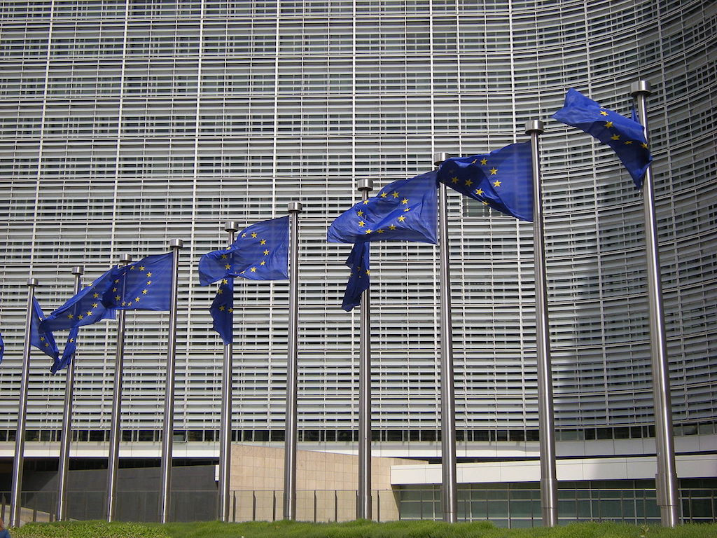 EU flags flying at the Berlaymont European Commission building in Brussels. 67% of EU citizens think that EU membership has benefited their country. Leandro Neumann Ciuffo/Creative Commons