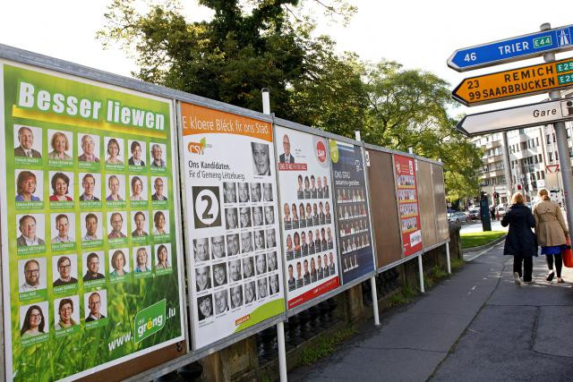 On 8 October, only 102 out of the 105 communes in Luxembourg will hold elections for new local councils. Pictured: local election campaign posters are in seen in this archive photo from September 2011. Oliver Minaire