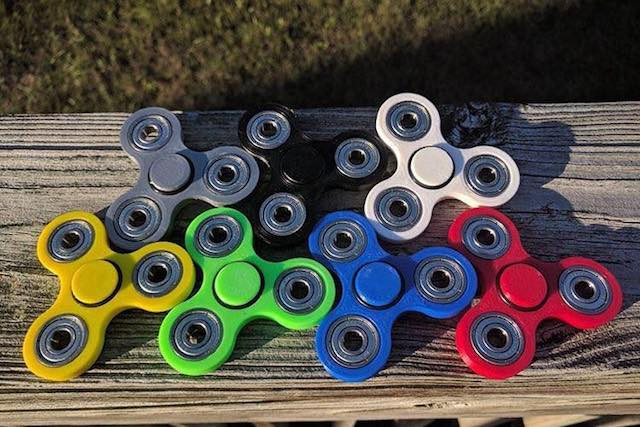 The popular kids’ toy comes in a range of shapes and colours, but parents are concerned about the risk of loose pieces becoming choking hazards Fidget Spinners Official Facebook Page