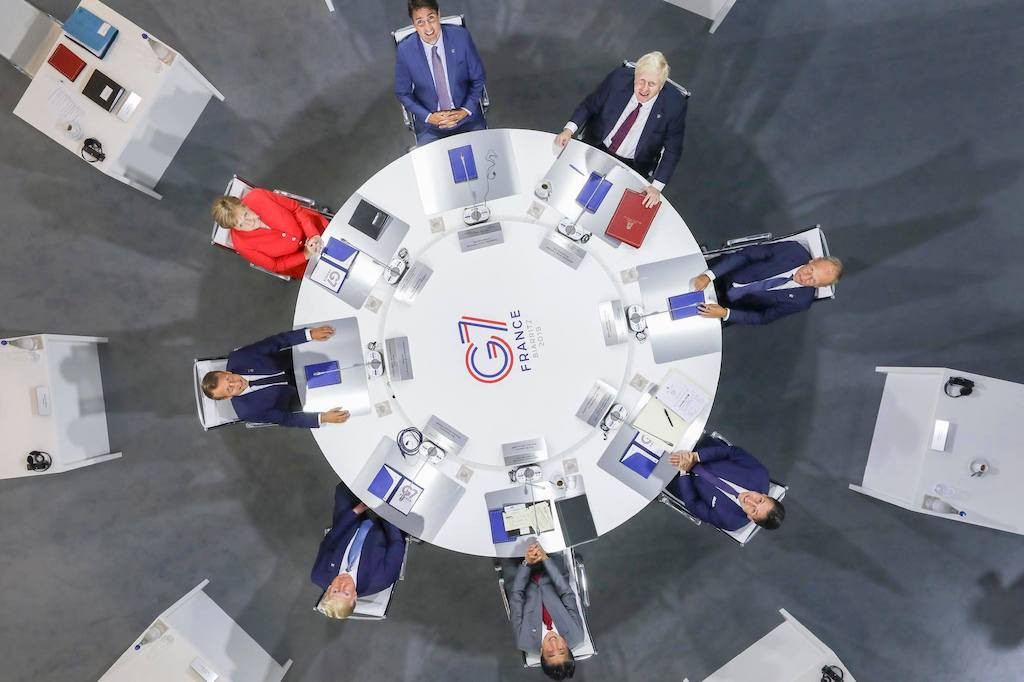 Round table: G7 leaders Emmanuel Macron, Angela Merkel, Justin Trudeau, Boris Johnson, Donald Tusk, Giuseppe Conte, Shinzō Abe and Donald Trump in Biarritz on Sunday. Photo: G7 France. G7 France