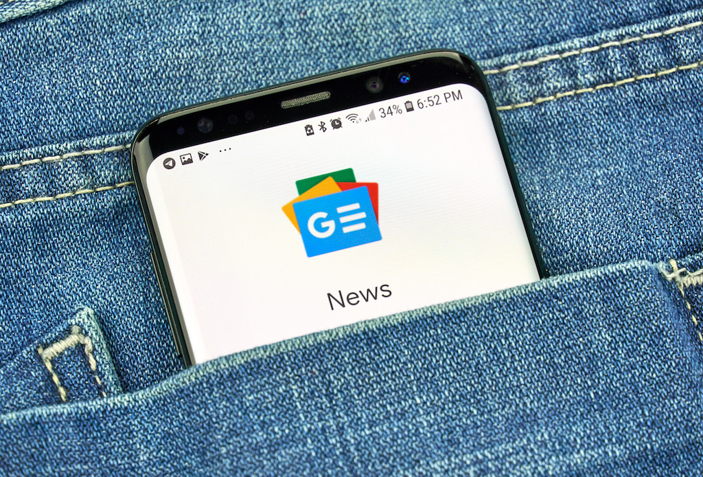 Google News app on s8 screen. The tech giant is lobbying hard against EU “link tax” legislation.  Shutterstock