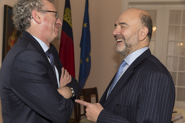 Library picture: Pierre Gramegna, Luxembourg’s finance minister, and Pierre Moscovici, the EU finance commissioner, speak during a signing ceremony for a tax agreement between the EU and Liechtenstein, 28 October 2015. Gramegna and Moscovici exchanged words over Luxembourg’s tax policies following the publication of a European Commission report on 7 March 2018. European Commission/Jean-François Badias