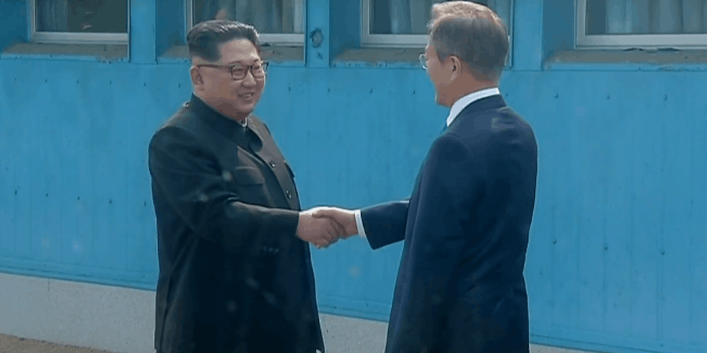 Historic handshake: Kim Jong-un and Moon Jae-in greet each other in the Korean demilitarised zone. YouTube Screengrab