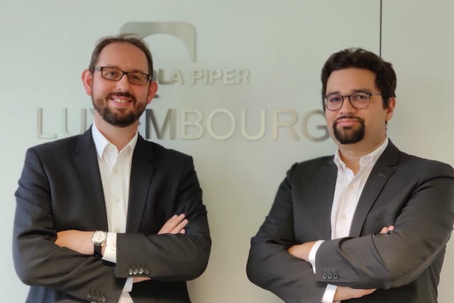 Olivier Reisch and David Alexandre of the law firm DLA Piper. DLA Piper