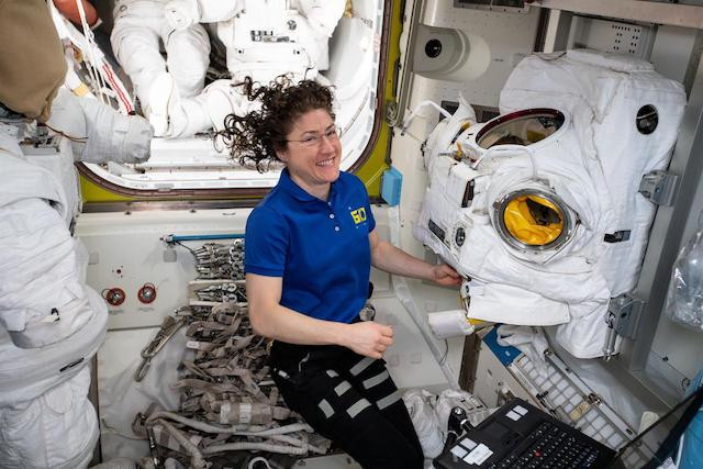 Pictured: Expedition 60 Flight Engineer Christina Koch of Nasa works on a US spacesuit in the Quest airlock. List is developing novel nontoxic and antimicrobial surface treatments for spacecraft indoors Nasa