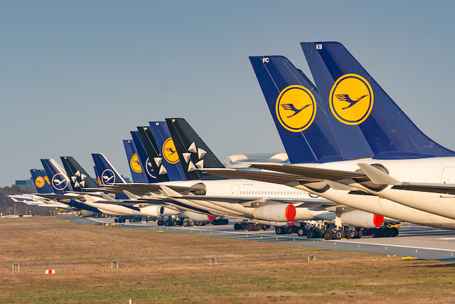 Illustration photo taken 7 April 2020 shows Lufthansa Airbus A330 and A340 grounded and stored at Frankfurt airport (FRA) in the Germany. Shutterstock