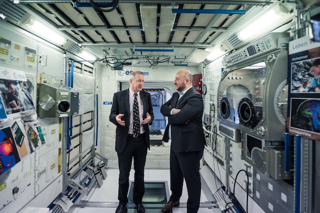 Economy minister Étienne Schneider speaking with Frank De Winne, head of ESA's European Astronaut Centre (EAC) Luxembourg Space Agency