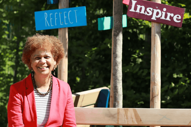 ISL lower school principal Patricia Angoy is pictured in the Reflection Garden, a place of peace and contemplation created as a legacy to her 10 years at ISL ISL