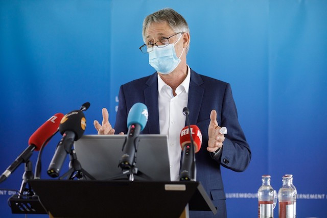 Internal security minister Henri Kox speaking during a press conference on 19 February Matic Zorman